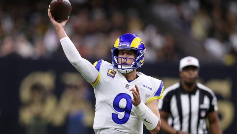 Nov 20, 2022; New Orleans, Louisiana, USA; Los Angeles Rams quarterback Matthew Stafford (9) makes a throw in the second quarter against the New Orleans Saints at the Caesars Superdome. Mandatory Credit: Chuck Cook-USA TODAY Sports