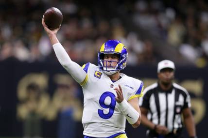Nov 20, 2022; New Orleans, Louisiana, USA; Los Angeles Rams quarterback Matthew Stafford (9) makes a throw in the second quarter against the New Orleans Saints at the Caesars Superdome. Mandatory Credit: Chuck Cook-USA TODAY Sports