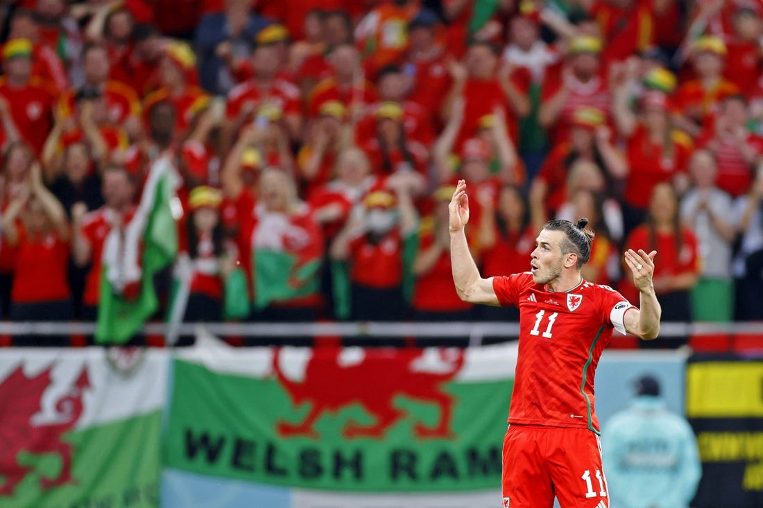 Nov 21, 2022; Al Rayyan, Qatar; Wales forward Gareth Bale (11) celebrates after scoring a goal against the United States of America on a penalty kick during the second half during a group stage match during the 2022 FIFA World Cup at Ahmed Bin Ali Stadium. Mandatory Credit: Yukihito Taguchi-USA TODAY Sports