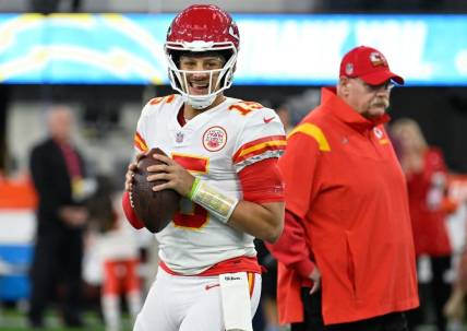 Nov 20, 2022; Inglewood, California, USA; Kansas City Chiefs quarterback Patrick Mahomes (15) and head coach Andy Reid during the pregame warmups before playing the Kansas City Chiefs at SoFi Stadium. Mandatory Credit: Robert Hanashiro-USA TODAY Sports