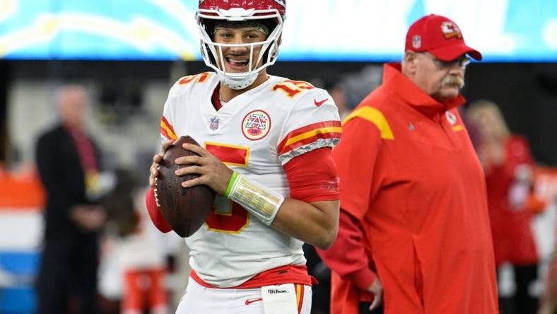 Nov 20, 2022; Inglewood, California, USA; Kansas City Chiefs quarterback Patrick Mahomes (15) and head coach Andy Reid during the pregame warmups before playing the Kansas City Chiefs at SoFi Stadium. Mandatory Credit: Robert Hanashiro-USA TODAY Sports