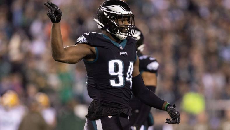 Nov 27, 2022; Philadelphia, Pennsylvania, USA; Philadelphia Eagles defensive end Josh Sweat (94) reacts to a tackle against the Green Bay Packers during the second quarter at Lincoln Financial Field. Mandatory Credit: Bill Streicher-USA TODAY Sports