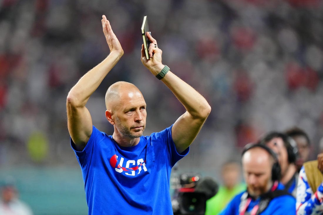 Dec 3, 2022; Al Rayyan, Qatar; United States of America manager Gregg Berhalter acknowledges fans after losing a round of sixteen match against the Netherlands in the 2022 FIFA World Cup at Khalifa International Stadium. Mandatory Credit: Danielle Parhizkaran-USA TODAY Sports