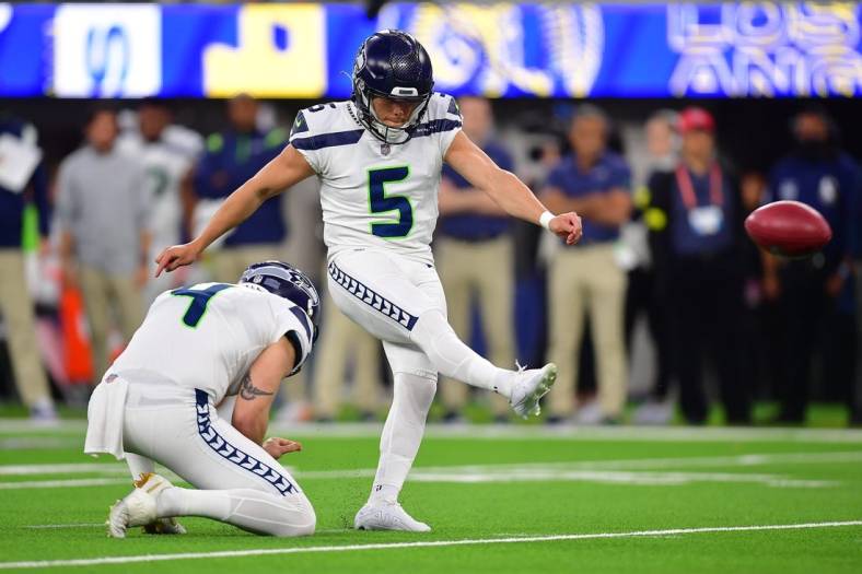 Dec 4, 2022; Inglewood, California, USA; Seattle Seahawks place kicker Jason Myers (5) kicks a field goal against the Los Angeles Rams during the second half at SoFi Stadium. Mandatory Credit: Gary A. Vasquez-USA TODAY Sports