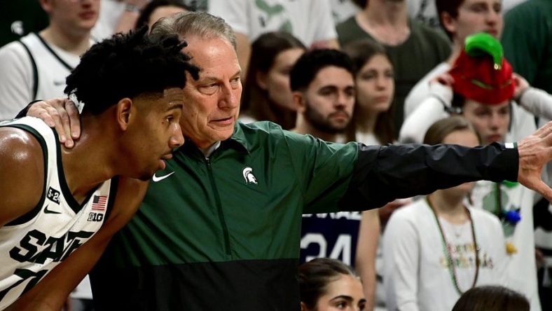 Dec 10, 2022; East Lansing, Michigan, USA;  Michigan State Spartans head coach Tom Izzo talks to guard A.J. Hoggard (11) in the second half against the Brown Bears at Jack Breslin Student Events Center. Mandatory Credit: Dale Young-USA TODAY Sports