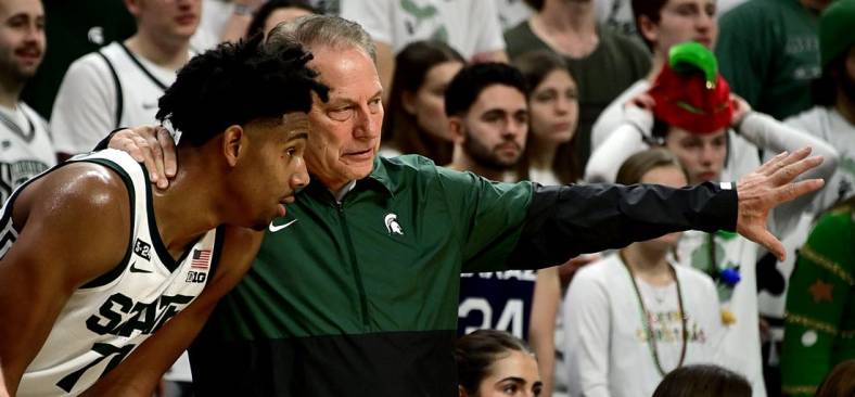 Dec 10, 2022; East Lansing, Michigan, USA;  Michigan State Spartans head coach Tom Izzo talks to guard A.J. Hoggard (11) in the second half against the Brown Bears at Jack Breslin Student Events Center. Mandatory Credit: Dale Young-USA TODAY Sports
