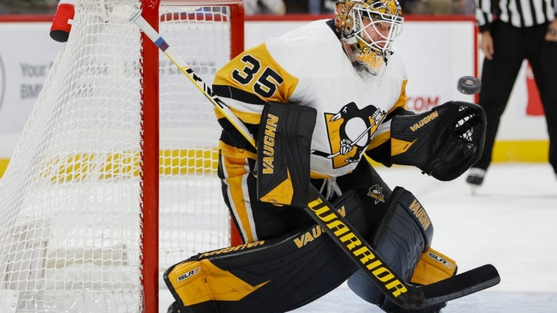Dec 15, 2022; Sunrise, Florida, USA; Pittsburgh Penguins goaltender Tristan Jarry (35) makes a save after a shot from Florida Panthers center Sam Bennett (not pictured) during the second period at FLA Live Arena. Mandatory Credit: Sam Navarro-USA TODAY Sports
