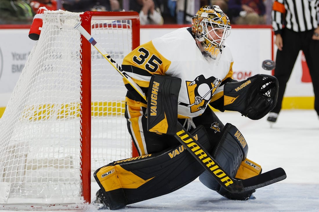 Dec 15, 2022; Sunrise, Florida, USA; Pittsburgh Penguins goaltender Tristan Jarry (35) makes a save after a shot from Florida Panthers center Sam Bennett (not pictured) during the second period at FLA Live Arena. Mandatory Credit: Sam Navarro-USA TODAY Sports