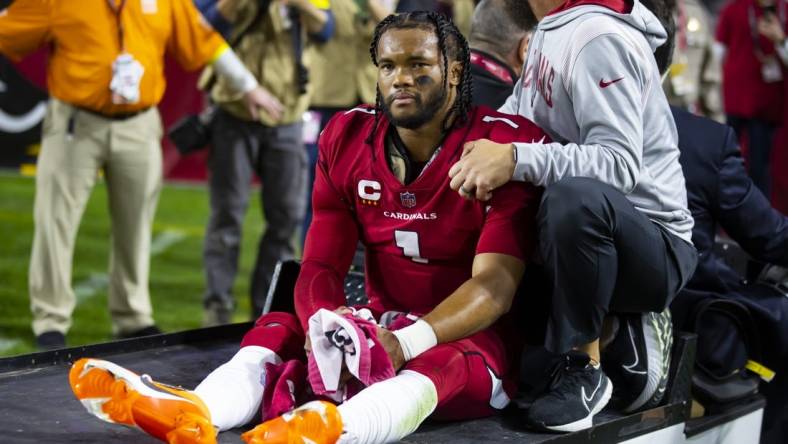 Dec 12, 2022; Glendale, Arizona, USA; Arizona Cardinals quarterback Kyler Murray reacts after suffering an injury against the New England Patriots in the first half at State Farm Stadium. Mandatory Credit: Mark J. Rebilas-USA TODAY Sports