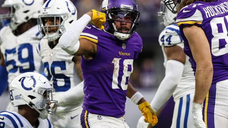 Dec 17, 2022; Minneapolis, Minnesota, USA; Minnesota Vikings wide receiver Justin Jefferson (18) reacts to his catch during the fourth quarter against the Indianapolis Colts at U.S. Bank Stadium. Mandatory Credit: Matt Krohn-USA TODAY Sports