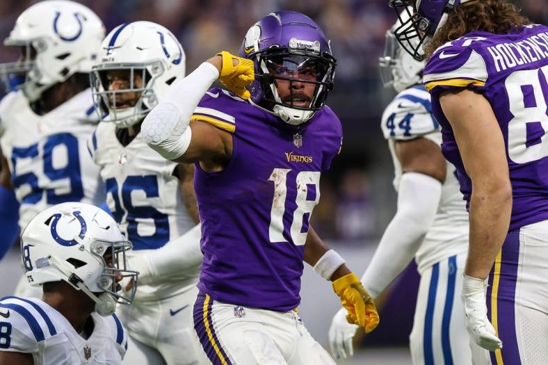 Dec 17, 2022; Minneapolis, Minnesota, USA; Minnesota Vikings wide receiver Justin Jefferson (18) reacts to his catch during the fourth quarter against the Indianapolis Colts at U.S. Bank Stadium. Mandatory Credit: Matt Krohn-USA TODAY Sports