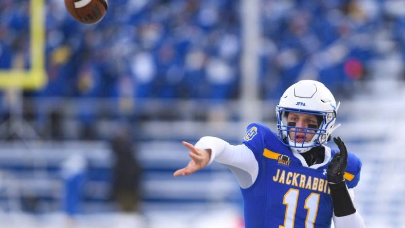 South Dakota State quarterback Mark Gronowski throws a pass while warming up before the FCS semifinal game against Montana State on Saturday, December 17, 2022, at Dana J. Dykhouse Stadium in Brookings, SD.

Fcs Semifinals 001