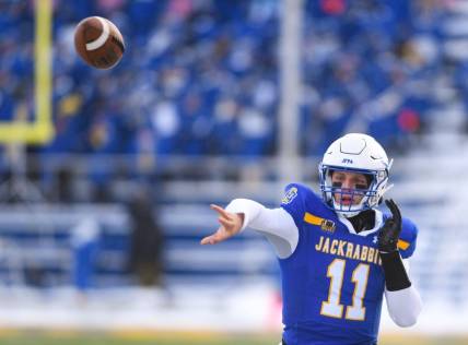 South Dakota State quarterback Mark Gronowski throws a pass while warming up before the FCS semifinal game against Montana State on Saturday, December 17, 2022, at Dana J. Dykhouse Stadium in Brookings, SD.

Fcs Semifinals 001