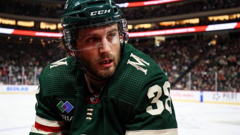 Dec 18, 2022; Saint Paul, Minnesota, USA; Minnesota Wild right wing Ryan Hartman (38) looks on during the first period against the Ottawa Senators at Xcel Energy Center. Mandatory Credit: Matt Krohn-USA TODAY Sports