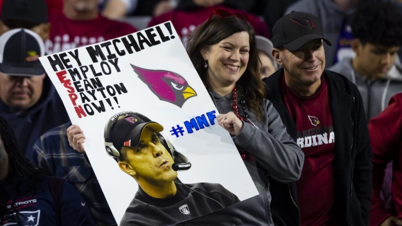 Dec 12, 2022; Glendale, Arizona, USA; An Arizona Cardinals fan in the crowd holds a sign for Sean Payton during the game against the New England Patriots at State Farm Stadium. Mandatory Credit: Mark J. Rebilas-USA TODAY Sports