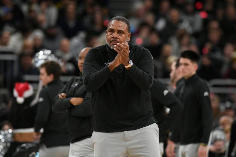 Dec 20, 2022; Providence, Rhode Island, USA; Providence Friars head coach Ed Cooley applauds the team during a timeout against the Marquette Golden Eagles during the first half at Amica Mutual Pavilion. Mandatory Credit: Eric Canha-USA TODAY Sports