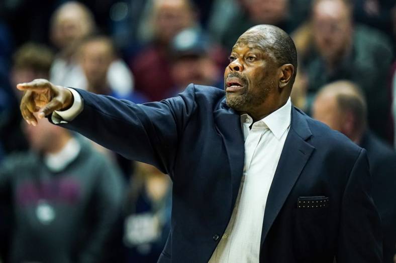 Dec 20, 2022; Storrs, Connecticut, USA; Georgetown Hoyas head coach Patrick Ewing watches from the sideline as they take on the UConn Huskies at Harry A. Gampel Pavilion. Mandatory Credit: David Butler II-USA TODAY Sports