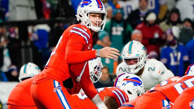 Dec 17, 2022; Orchard Park, New York, USA; Buffalo Bills quarterback Josh Allen (17) looks to the sidelines prior to the snap during the first half against the Miami Dolphins at Highmark Stadium. Mandatory Credit: Gregory Fisher-USA TODAY Sports