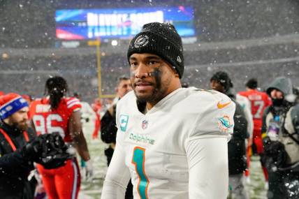 Dec 17, 2022; Orchard Park, New York, USA; Miami Dolphins quarterback Tua Tagovailoa (1) after the game against the Buffalo Bills at Highmark Stadium. Mandatory Credit: Gregory Fisher-USA TODAY Sports