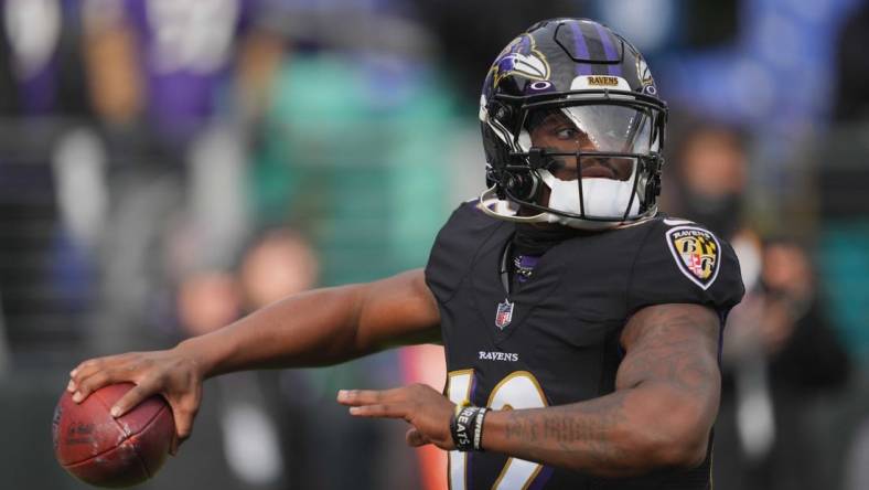 Dec 24, 2022; Baltimore, Maryland, USA; Baltimore Ravens quarterback Anthony Brown (12) warms up prior to the game against the Atlanta Falcons at M&T Bank Stadium. Mandatory Credit: Mitch Stringer-USA TODAY Sports