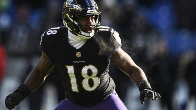 Dec 24, 2022; Baltimore, Maryland, USA;  Baltimore Ravens linebacker Roquan Smith (18) drops back in passed coverage during the first half against the Atlanta Falcons at M&T Bank Stadium. Mandatory Credit: Tommy Gilligan-USA TODAY Sports