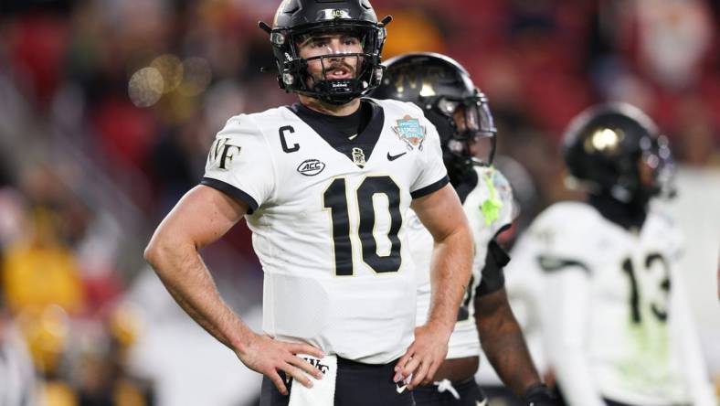 Dec 23, 2022; Tampa, Florida, USA; Wake Forest Demon Deacons quarterback Sam Hartman (10) waits for a play call against the Missouri Tigers during  the second quarter in the 2022 Gasparilla Bowl at Raymond James Stadium. Mandatory Credit: Nathan Ray Seebeck-USA TODAY Sports