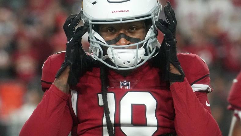 Dec 25, 2022; Glendale, Arizona, USA; Arizona Cardinals receiver DeAndre Hopkins (10) warms up before their game agaionst the Tampa Bay Buccaneers at State Farm Stadium. Mandatory Credit: Joe Rondone-USA TODAY Sports