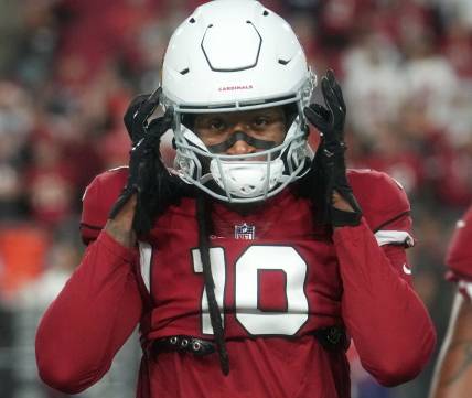Dec 25, 2022; Glendale, Arizona, USA; Arizona Cardinals receiver DeAndre Hopkins (10) warms up before their game agaionst the Tampa Bay Buccaneers at State Farm Stadium. Mandatory Credit: Joe Rondone-USA TODAY Sports