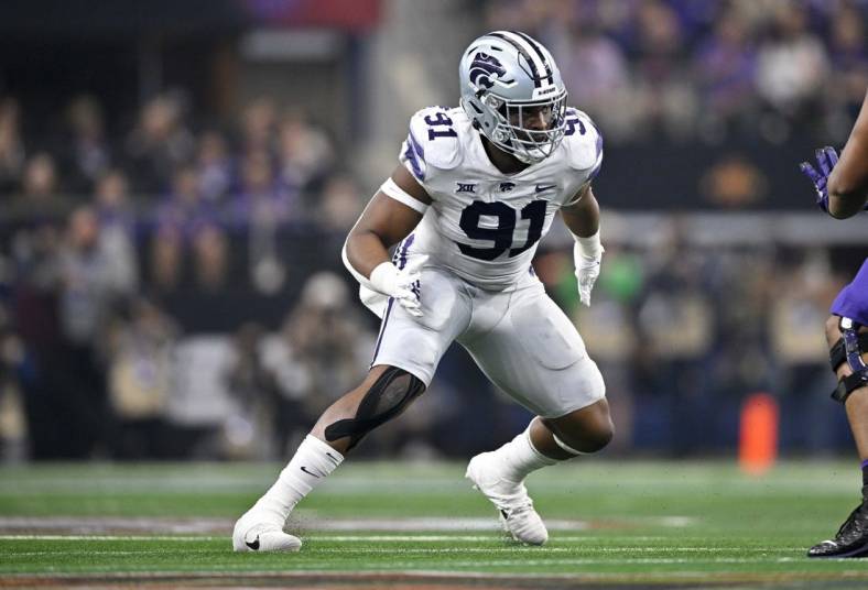 Dec 3, 2022; Arlington, TX, USA; Kansas State Wildcats defensive end Felix Anudike-Uzomah (91) in action during the game between the TCU Horned Frogs and the Kansas State Wildcats at AT&T Stadium. Mandatory Credit: Jerome Miron-USA TODAY Sports