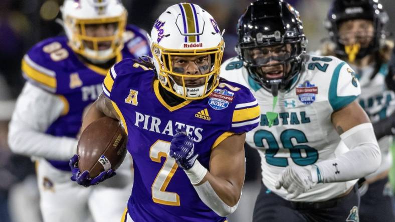 Dec 27, 2022; Birmingham, Alabama, USA; East Carolina Pirates running back Keaton Mitchell (2) runs for a gain against the Coastal Carolina Chanticleers in the 2022 Birmingham Bowl at Protective Stadium. Mandatory Credit: Vasha Hunt-USA TODAY Sports