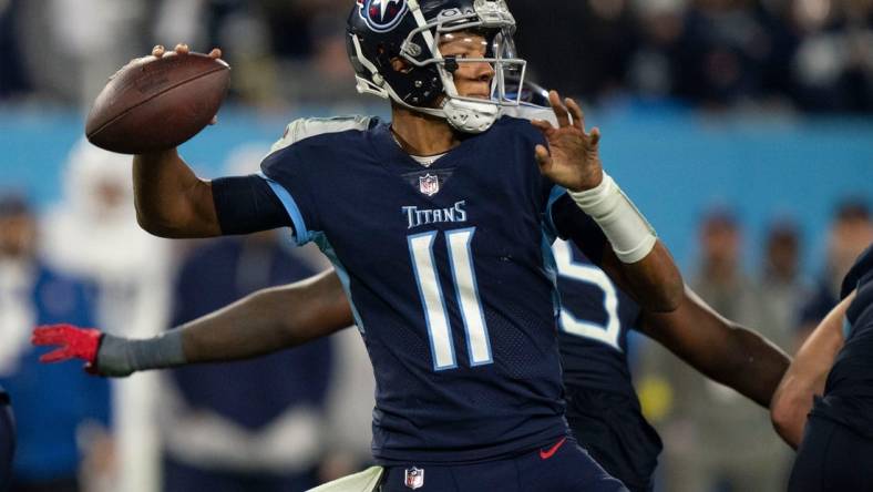 Tennessee Titans quarterback Joshua Dobbs (11) throws a pass against the Dallas Cowboys during the fourth quarter at Nissan Stadium Thursday, Dec. 29, 2022, in Nashville, Tenn.

Nfl Dallas Cowboys At Tennessee Titans