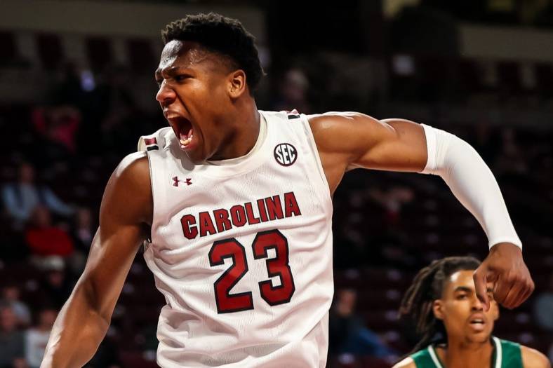 Dec 30, 2022; Columbia, South Carolina, USA; South Carolina Gamecocks forward Gregory Jackson II (23) reacts after dunking against the Eastern Michigan Eagles in the first half at Colonial Life Arena. Mandatory Credit: Jeff Blake-USA TODAY Sports
