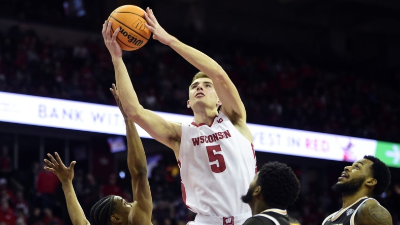 Dec 30, 2022; Madison, Wisconsin, USA; Wisconsin Badgers forward Tyler Wahl (5) shoots against the Western Michigan Broncos during the second half at the Kohl Center. Mandatory Credit: Kayla Wolf-USA TODAY Sports