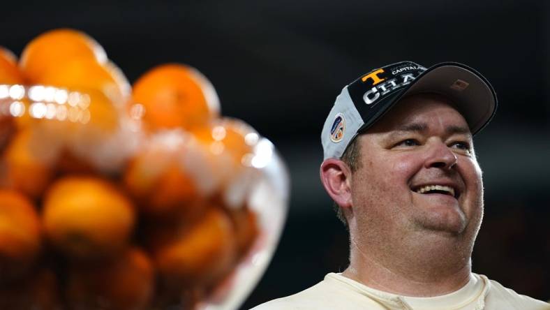 Dec 30, 2022; Miami Gardens, FL, USA; Tennessee Volunteers head coach Josh Heupel looks on after defeating the Clemson Tigers in the 2022 Orange Bowl at Hard Rock Stadium. Mandatory Credit: Rich Storry-USA TODAY Sports