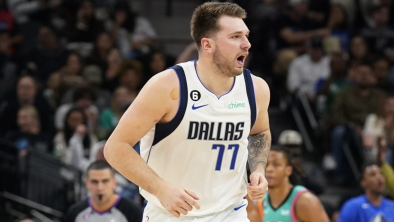 Dec 31, 2022; San Antonio, Texas, USA; Dallas Mavericks guard Luka Doncic (77) reacts after scoring a three point basket against the San Antonio Spurs during the first half at AT&T Center. Mandatory Credit: Scott Wachter-USA TODAY Sports
