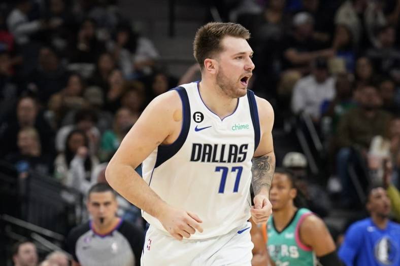 Dec 31, 2022; San Antonio, Texas, USA; Dallas Mavericks guard Luka Doncic (77) reacts after scoring a three point basket against the San Antonio Spurs during the first half at AT&T Center. Mandatory Credit: Scott Wachter-USA TODAY Sports
