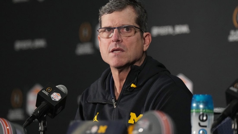 Dec 31, 2022; Glendale, Arizona, USA; Michigan Wolverines head coach Jim Harbaugh speaks to the media after the 2022 Fiesta Bowl won by the TCU Horned Frogs, 51-45, at State Farm Stadium. Mandatory Credit: Kirby Lee-USA TODAY Sports