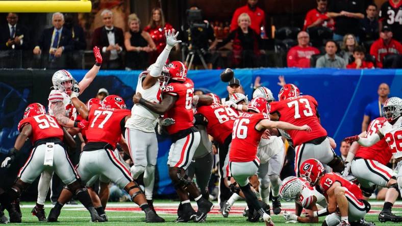 Dec 31, 2022; Atlanta, Georgia, USA; Georgia Bulldogs place kicker Jack Podlesny (96) attempts a field goal against the Ohio State Buckeyes during the second quarter of the 2022 Peach Bowl at Mercedes-Benz Stadium. Mandatory Credit: John David Mercer-USA TODAY Sports