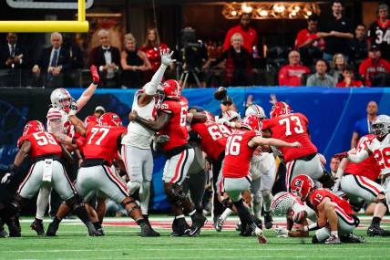 Dec 31, 2022; Atlanta, Georgia, USA; Georgia Bulldogs place kicker Jack Podlesny (96) attempts a field goal against the Ohio State Buckeyes during the second quarter of the 2022 Peach Bowl at Mercedes-Benz Stadium. Mandatory Credit: John David Mercer-USA TODAY Sports