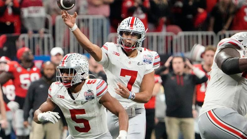 Dec 31, 2022; Atlanta, Georgia, USA;  Ohio State Buckeyes quarterback C.J. Stroud (7) throws a pass during the second half of the Peach Bowl in the College Football Playoff semifinal at Mercedes-Benz Stadium. Ohio State lost 42-41. Mandatory Credit: Adam Cairns-The Columbus Dispatch

Ncaa Football Peach Bowl Ohio State At Georgia