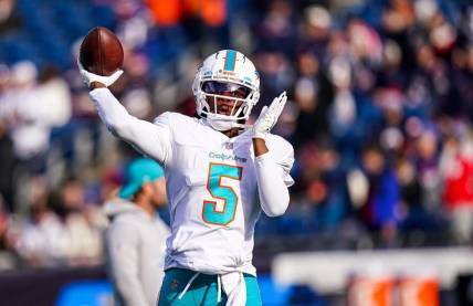 Jan 1, 2023; Foxborough, Massachusetts, USA; Miami Dolphins quarterback Teddy Bridgewater (5) warms up before the start of the game against the New England Patriots at Gillette Stadium. Mandatory Credit: David Butler II-USA TODAY Sports