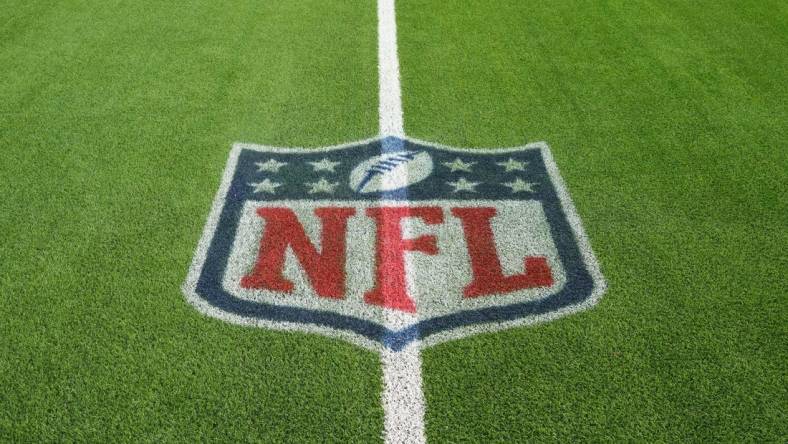 Jan 1, 2023; Inglewood, California, USA; A NFL shield logo on the field  at SoFi Stadium. Mandatory Credit: Kirby Lee-USA TODAY Sports