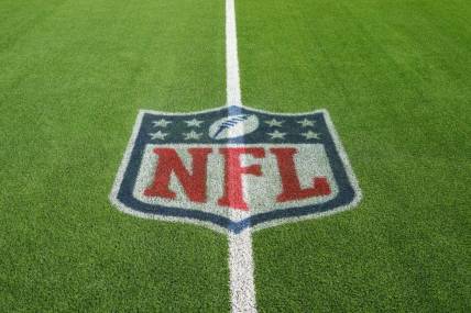 Jan 1, 2023; Inglewood, California, USA; A NFL shield logo on the field  at SoFi Stadium. Mandatory Credit: Kirby Lee-USA TODAY Sports