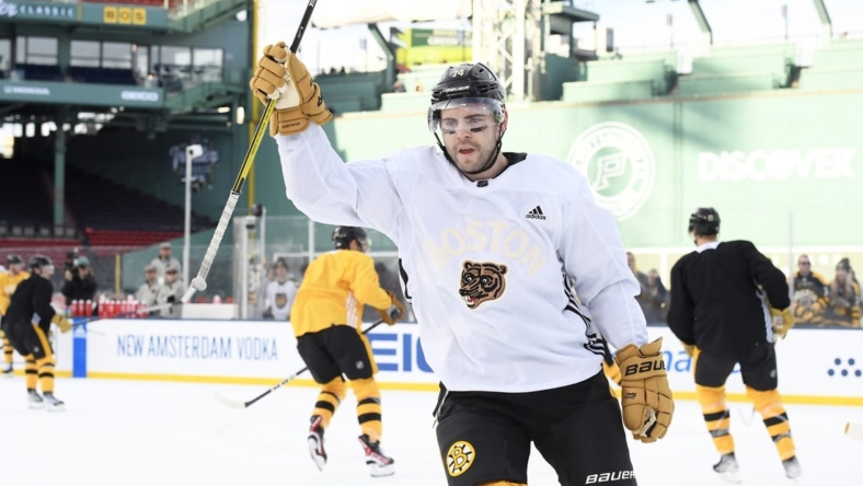 Jan 1, 2023; Boston, MA, USA; Boston Bruins left wing Jake DeBrusk (74) during a practice day before the 2023 Winter Classic ice hockey game at Fenway Park. Mandatory Credit: Bob DeChiara-USA TODAY Sports