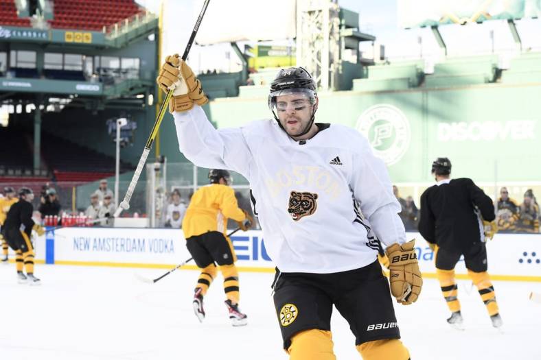 Jan 1, 2023; Boston, MA, USA; Boston Bruins left wing Jake DeBrusk (74) during a practice day before the 2023 Winter Classic ice hockey game at Fenway Park. Mandatory Credit: Bob DeChiara-USA TODAY Sports