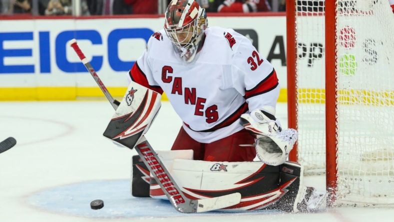Jan 1, 2023; Newark, New Jersey, USA; Carolina Hurricanes goaltender Antti Raanta (32) makes a save against the New Jersey Devils during the third period at Prudential Center. Mandatory Credit: Thomas Salus-USA TODAY Sports