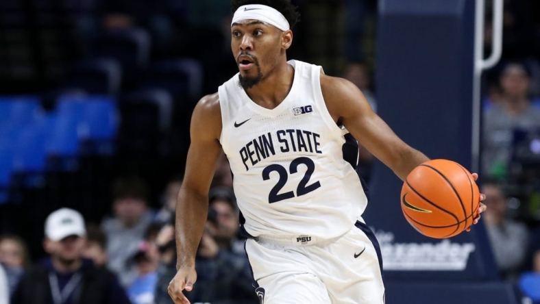 Jan 1, 2023; University Park, Pennsylvania, USA; Penn State Nittany Lions guard Jalen Pickett (22) dribbles the ball during the first half against the Iowa Hawkeyes at Bryce Jordan Center. Mandatory Credit: Matthew OHaren-USA TODAY Sports
