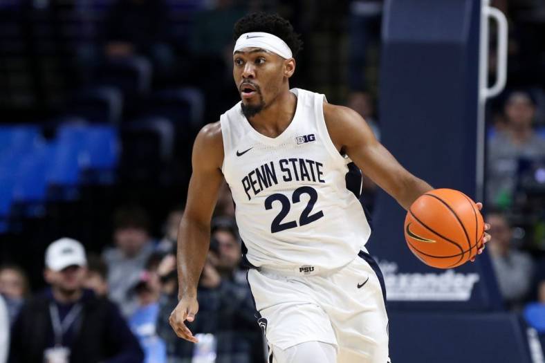 Jan 1, 2023; University Park, Pennsylvania, USA; Penn State Nittany Lions guard Jalen Pickett (22) dribbles the ball during the first half against the Iowa Hawkeyes at Bryce Jordan Center. Mandatory Credit: Matthew OHaren-USA TODAY Sports