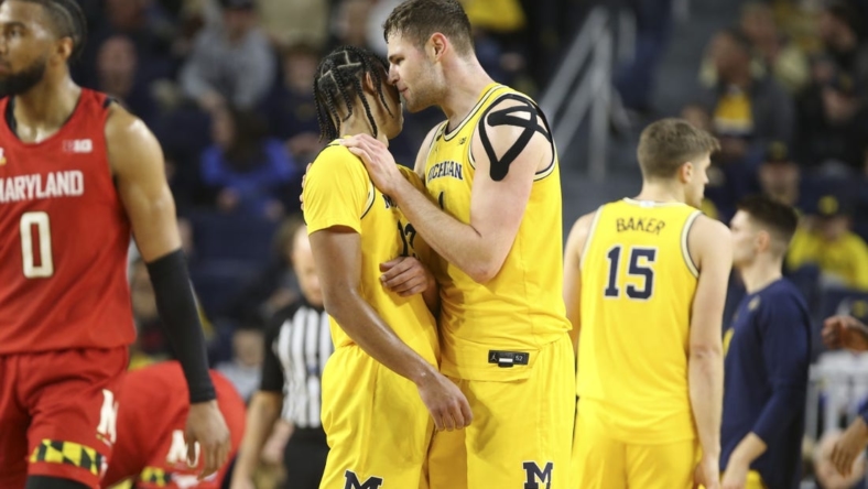 Jan 1, 2023; Ann Arbor, Michigan, USA; Michigan Wolverines center Hunter Dickinson (1) talks with guard Jett Howard (13) during the second half of the game against the Maryland Terrapins at Crisler Center. Mandatory Credit: Brian Bradshaw Sevald-USA TODAY Sports
