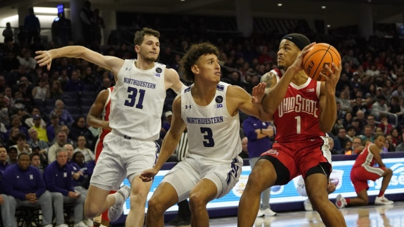 Jan 1, 2023; Evanston, Illinois, USA; Northwestern Wildcats guard Ty Berry (3) defends Ohio State Buckeyes guard Roddy Gayle Jr. (1) during the first half at Welsh-Ryan Arena. Mandatory Credit: David Banks-USA TODAY Sports